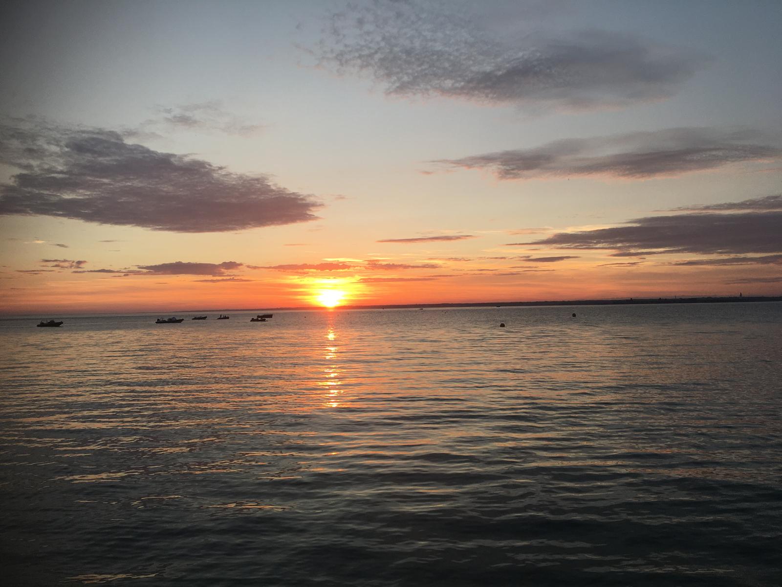 Sunset reflected on calm water